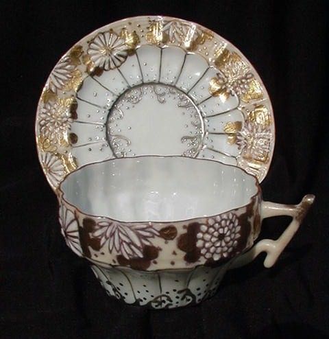 Japanese Cup and Saucer, Raised Slip Decoration Japanese Cup and Saucer, Raised Slip Decoration