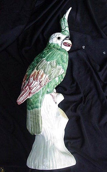 Fabulous Mottahedeh Green Parrot on Tree Trunk Perch, Italy Fabulous Mottahedeh Green Parrot on Tree Trunk Perch, Italy