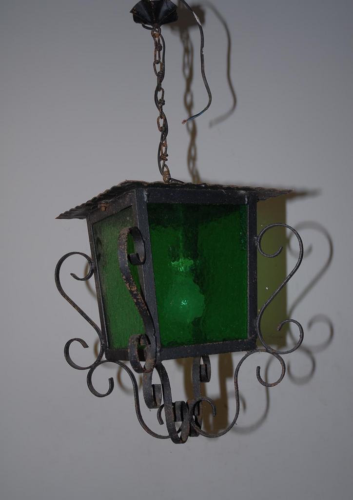 A French Antique Wrought Iron Glass Lantern A French Antique Wrought Iron Glass Lantern