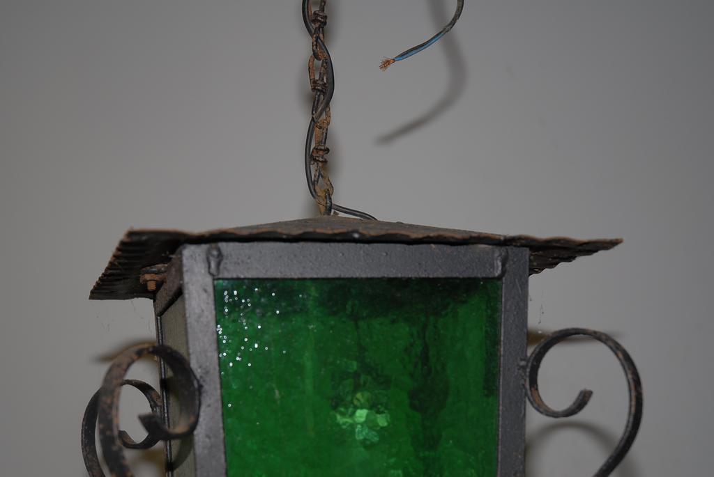 A French Antique Wrought Iron Glass Lantern A French Antique Wrought Iron Glass Lantern