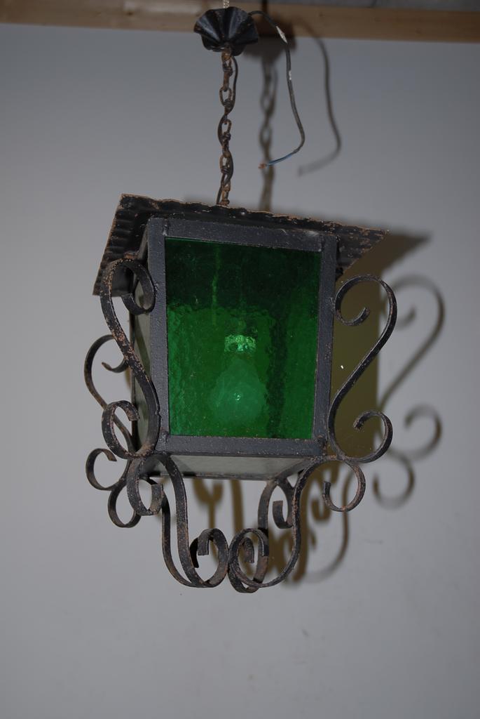 A French Antique Wrought Iron Glass Lantern A French Antique Wrought Iron Glass Lantern