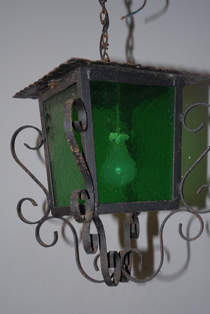 A French Antique Wrought Iron Glass Lantern A French Antique Wrought Iron Glass Lantern