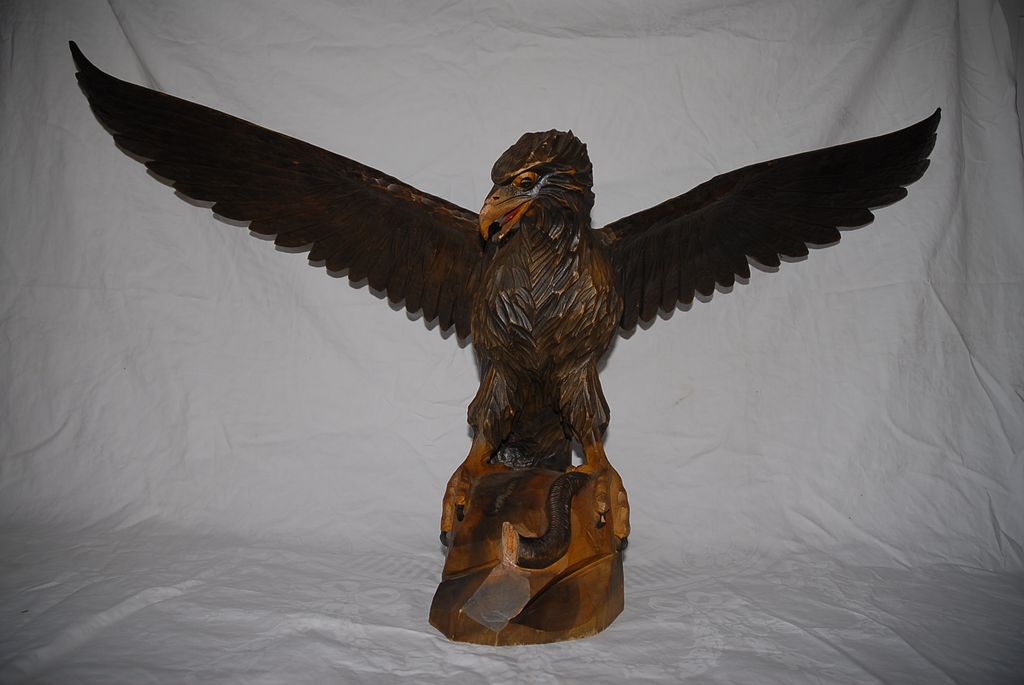 A Fabulous Large Fine Carved Wood Black Forest Eagle Sculpture Standing on a Rock A Fabulous Large Fine Carved Wood Black Forest Eagle Sculpture Standing on a Rock
