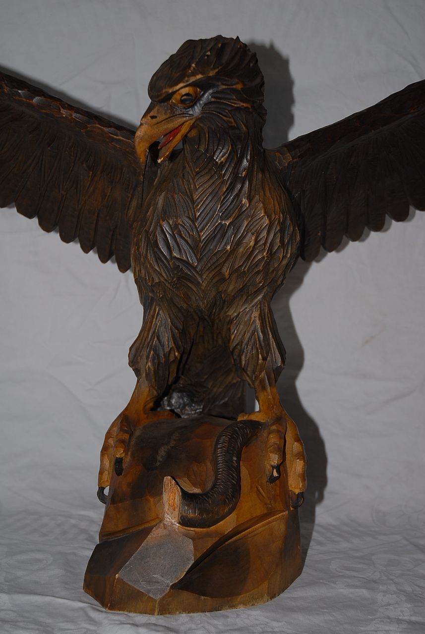 A Fabulous Large Fine Carved Wood Black Forest Eagle Sculpture Standing on a Rock A Fabulous Large Fine Carved Wood Black Forest Eagle Sculpture Standing on a Rock