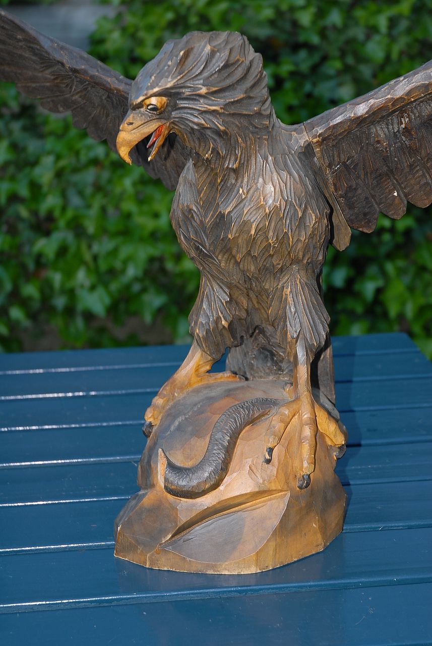 A Fabulous Large Fine Carved Wood Black Forest Eagle Sculpture Standing on a Rock A Fabulous Large Fine Carved Wood Black Forest Eagle Sculpture Standing on a Rock