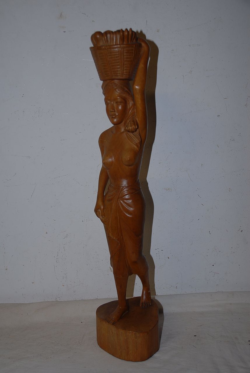 An Art Deco Carved Wood Javanese Lady Sculpture An Art Deco Carved Wood Javanese Lady Sculpture