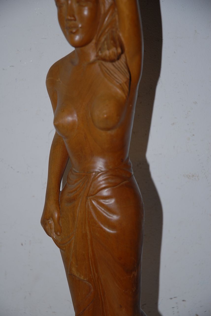 An Art Deco Carved Wood Javanese Lady Sculpture An Art Deco Carved Wood Javanese Lady Sculpture