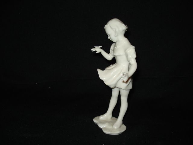 Hutschenreuther figurine w/ butterfly Hutschenreuther figurine w/ butterfly