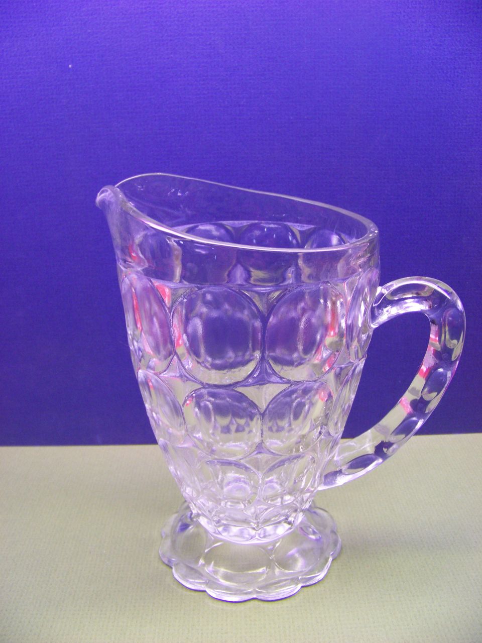 Glass Thumbprint Pitcher Clear Juice Pitcher with a thumbprint design Glass Thumbprint Pitcher Clear Juice Pitcher with a thumbprint design