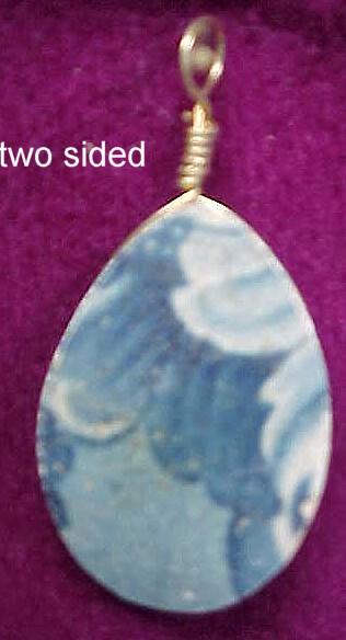 Double Sided Pendant Fashioned from Antique Pottery Shard Double Sided Pendant Fashioned from Antique Pottery Shard