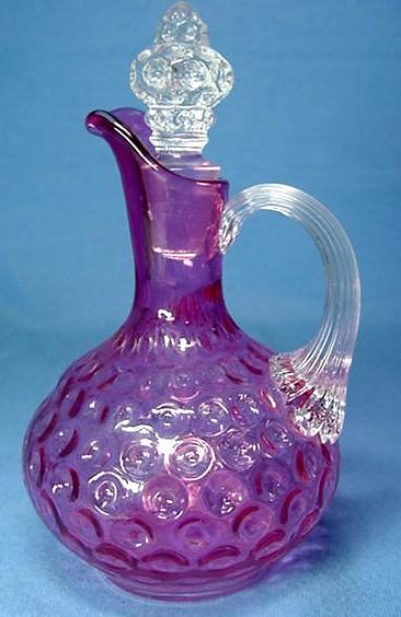 Pale Cranberry Glass Cruet with Ribbed Handle Pale Cranberry Glass Cruet with Ribbed Handle