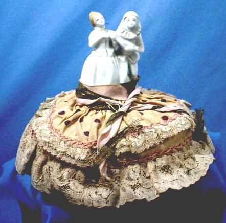 Pin Cushion with Figures of a Lady and Pierrot Pin Cushion with Figures of a Lady and Pierrot