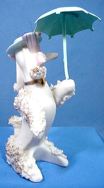 Gorgeous Spaghetti Poodle with Blue Hat and Umbrella Gorgeous Spaghetti Poodle with Blue Hat and Umbrella