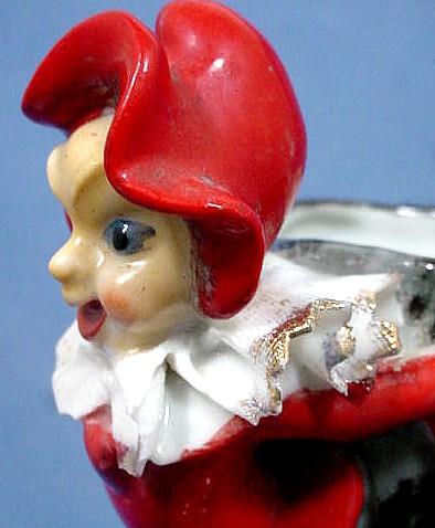Tree Stump Vase with Mischievous Red Elf or Pixie Tree Stump Vase with Mischievous Red Elf or Pixie