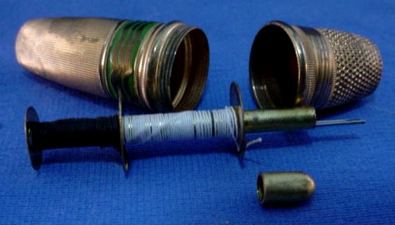 Antique Ornate Gilded Brass Cylindrical Mini Sewing Kit with Thimble Cap Antique Ornate Gilded Brass Cylindrical Mini Sewing Kit with Thimble Cap