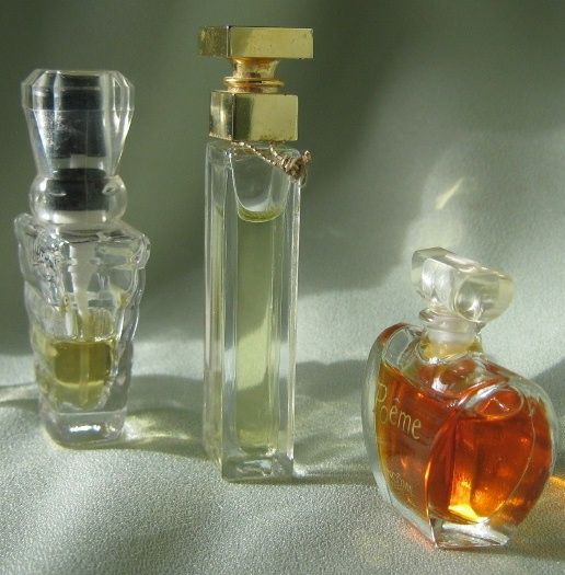 Miniature Perfume Trio of "Tresor, Poeme & Fifth Avenue" Miniature Perfume Trio of "Tresor, Poeme & Fifth Avenue"