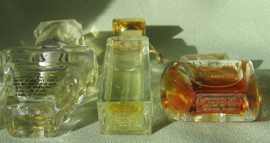 Miniature Perfume Trio of "Tresor, Poeme & Fifth Avenue" Miniature Perfume Trio of "Tresor, Poeme & Fifth Avenue"