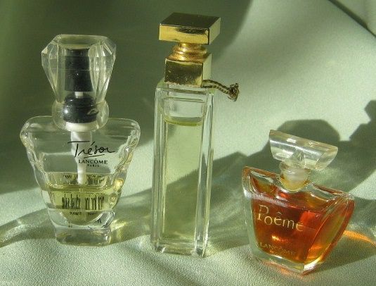 Miniature Perfume Trio of "Tresor, Poeme & Fifth Avenue" Miniature Perfume Trio of "Tresor, Poeme & Fifth Avenue"