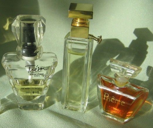 Miniature Perfume Trio of "Tresor, Poeme & Fifth Avenue" Miniature Perfume Trio of "Tresor, Poeme & Fifth Avenue"