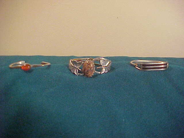 Set of 3 Silver Tone Bracelets With Various Designs Set of 3 Silver Tone Bracelets With Various Designs