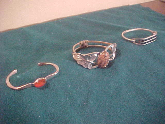 Set of 3 Silver Tone Bracelets With Various Designs Set of 3 Silver Tone Bracelets With Various Designs