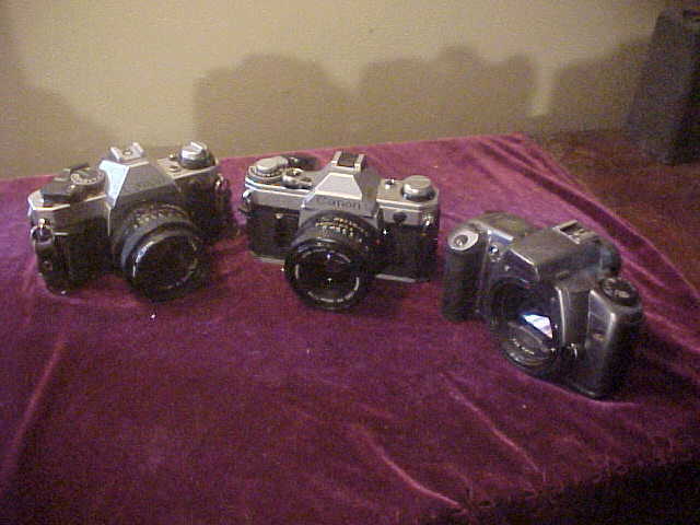 Lot of 3 Very Nice Vintage Canon 35mm Cameras W/Accessories Lot of 3 Very Nice Vintage Canon 35mm Cameras W/Accessories