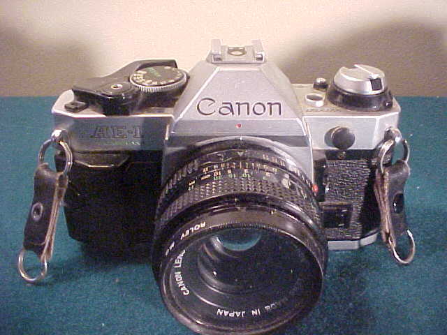 Lot of 3 Very Nice Vintage Canon 35mm Cameras W/Accessories Lot of 3 Very Nice Vintage Canon 35mm Cameras W/Accessories