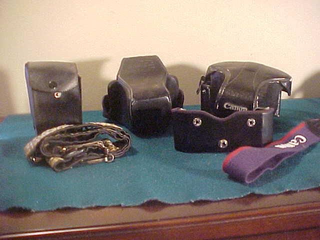 Lot of 3 Very Nice Vintage Canon 35mm Cameras W/Accessories Lot of 3 Very Nice Vintage Canon 35mm Cameras W/Accessories