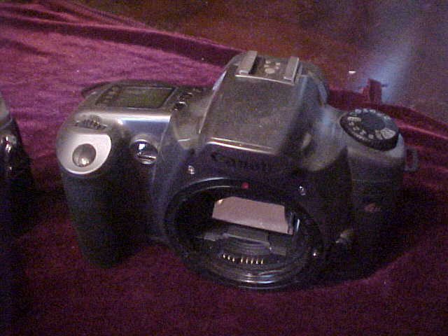Lot of 3 Very Nice Vintage Canon 35mm Cameras W/Accessories Lot of 3 Very Nice Vintage Canon 35mm Cameras W/Accessories