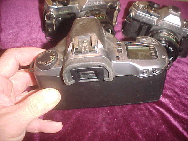Lot of 3 Very Nice Vintage Canon 35mm Cameras W/Accessories Lot of 3 Very Nice Vintage Canon 35mm Cameras W/Accessories