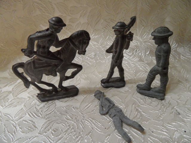 4 Vintage Toy Die Cast Lead Soldiers, one on Horse 4 Vintage Toy Die Cast Lead Soldiers, one on Horse