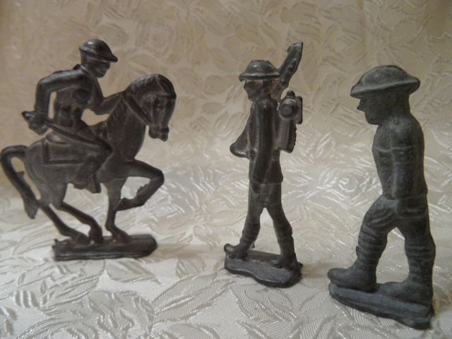 4 Vintage Toy Die Cast Lead Soldiers, one on Horse 4 Vintage Toy Die Cast Lead Soldiers, one on Horse
