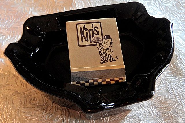 Black Milk Glass Ashtray with Kip's Big Boy Matchbook Black Milk Glass Ashtray with Kip's Big Boy Matchbook