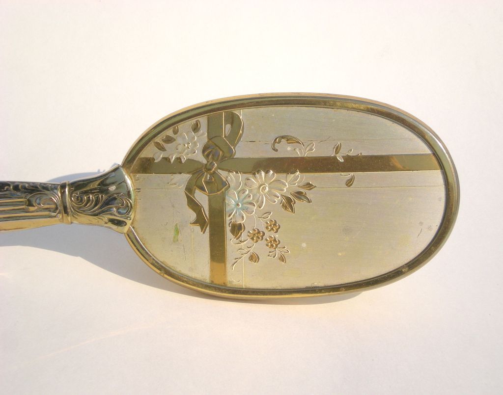 Vintage Hairbrush Goldtone w/Flowers & Ribbon Design Vintage Hairbrush Goldtone w/Flowers & Ribbon Design