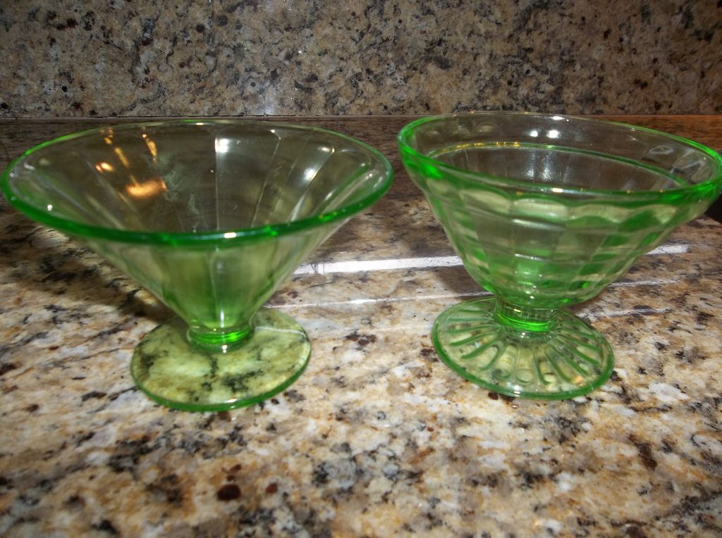 Pair of 1930's Federal green glass sherbert dishes. Pair of 1930's Federal green glass sherbert dishes.