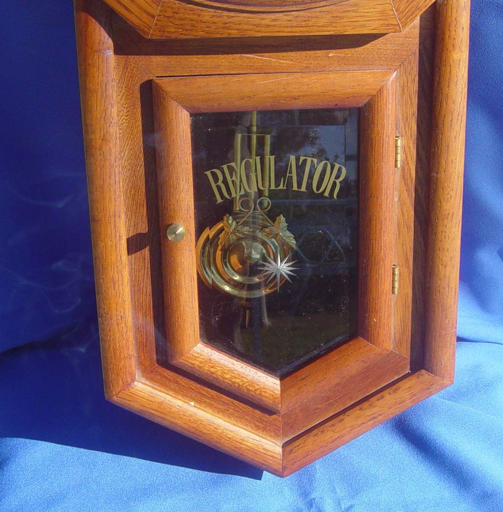 D & A Regulator Style Oak Finish Wall Clock D & A Regulator Style Oak Finish Wall Clock