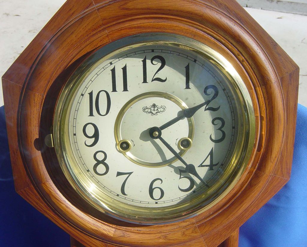 D & A Regulator Style Oak Finish Wall Clock D & A Regulator Style Oak Finish Wall Clock