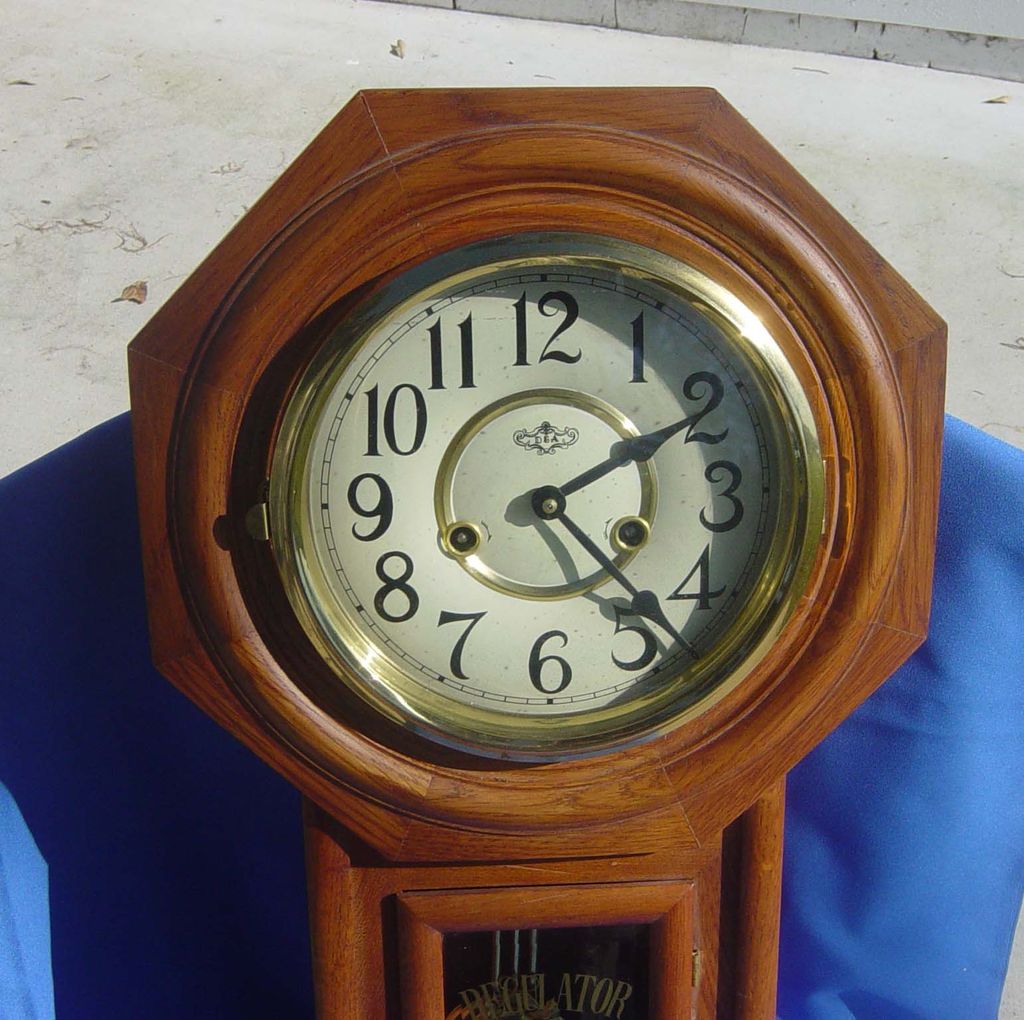 D & A Regulator Style Oak Finish Wall Clock D & A Regulator Style Oak Finish Wall Clock