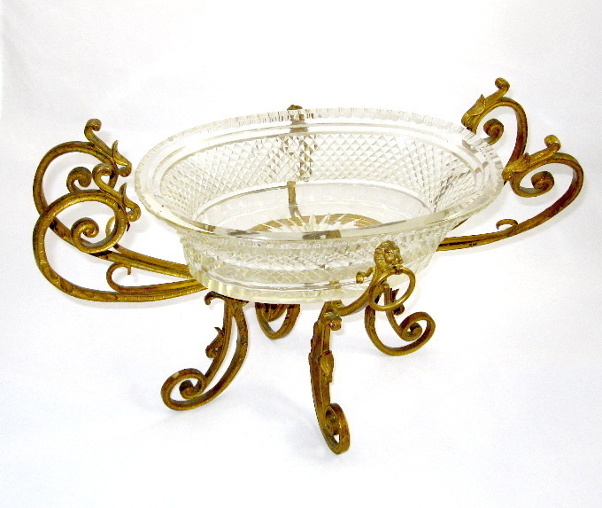 A Napoleon III Cut Crystal Centerpiece with Dore bronze Mounts. A Napoleon III Cut Crystal Centerpiece with Dore bronze Mounts.