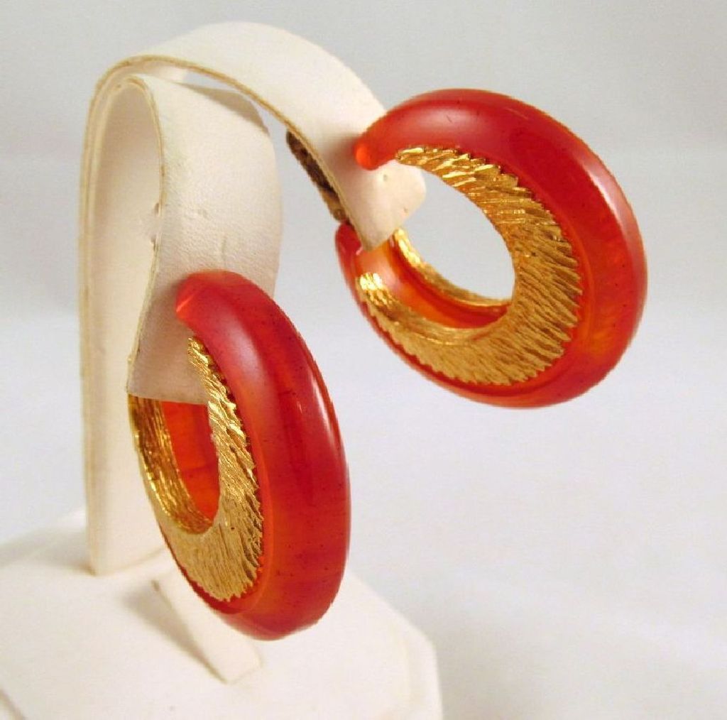 Swirled Red Orange Bakelite Earrings Embedded Goldtone Metal Accents Swirled Red Orange Bakelite Earrings Embedded Goldtone Metal Accents