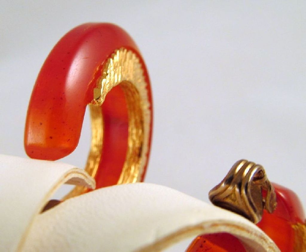 Swirled Red Orange Bakelite Earrings Embedded Goldtone Metal Accents Swirled Red Orange Bakelite Earrings Embedded Goldtone Metal Accents