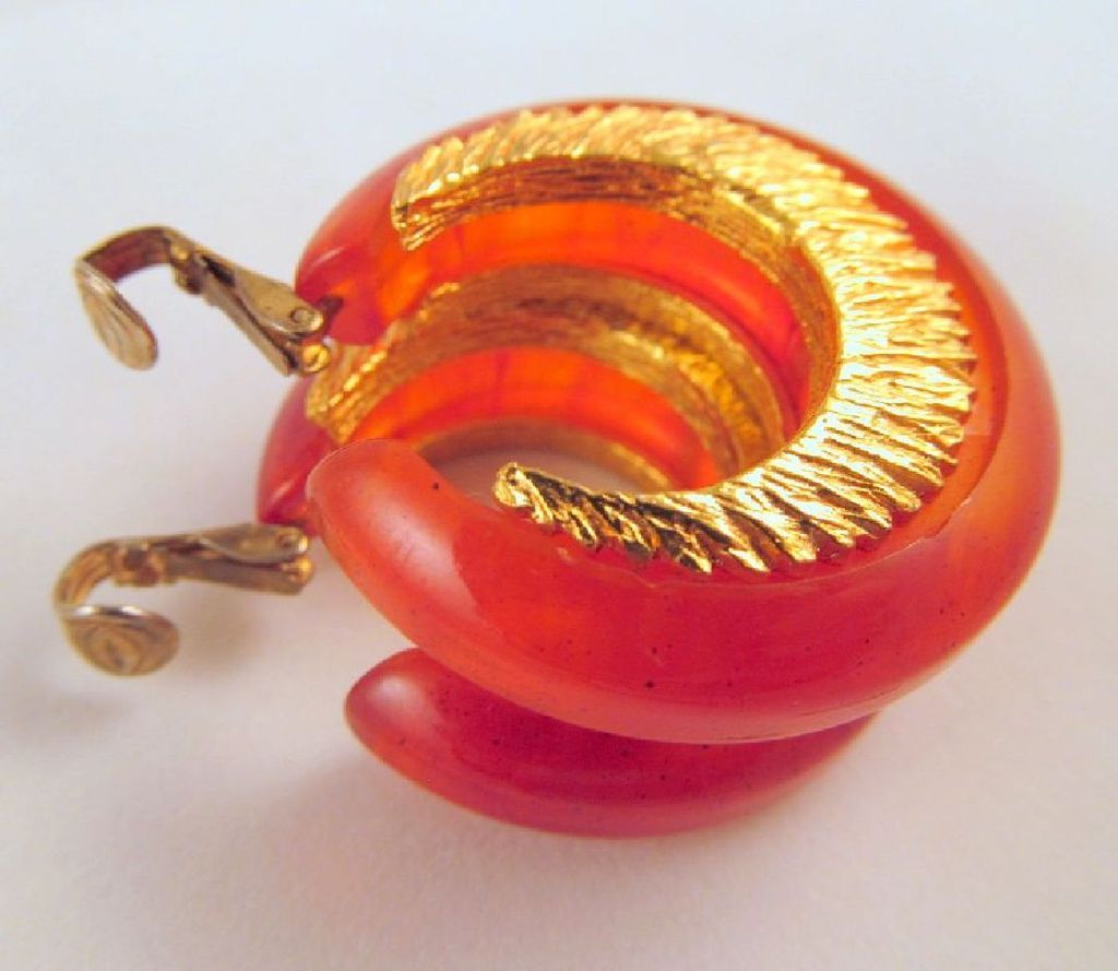Swirled Red Orange Bakelite Earrings Embedded Goldtone Metal Accents Swirled Red Orange Bakelite Earrings Embedded Goldtone Metal Accents