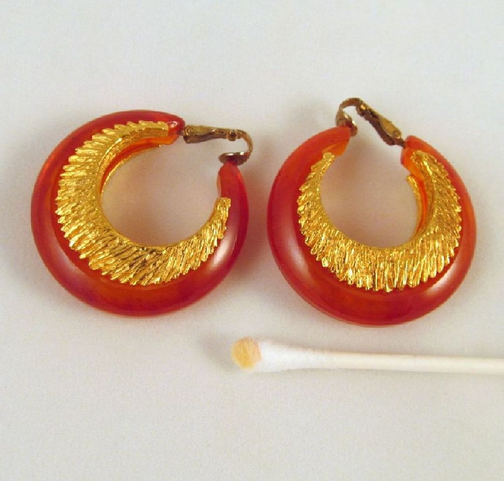 Swirled Red Orange Bakelite Earrings Embedded Goldtone Metal Accents Swirled Red Orange Bakelite Earrings Embedded Goldtone Metal Accents