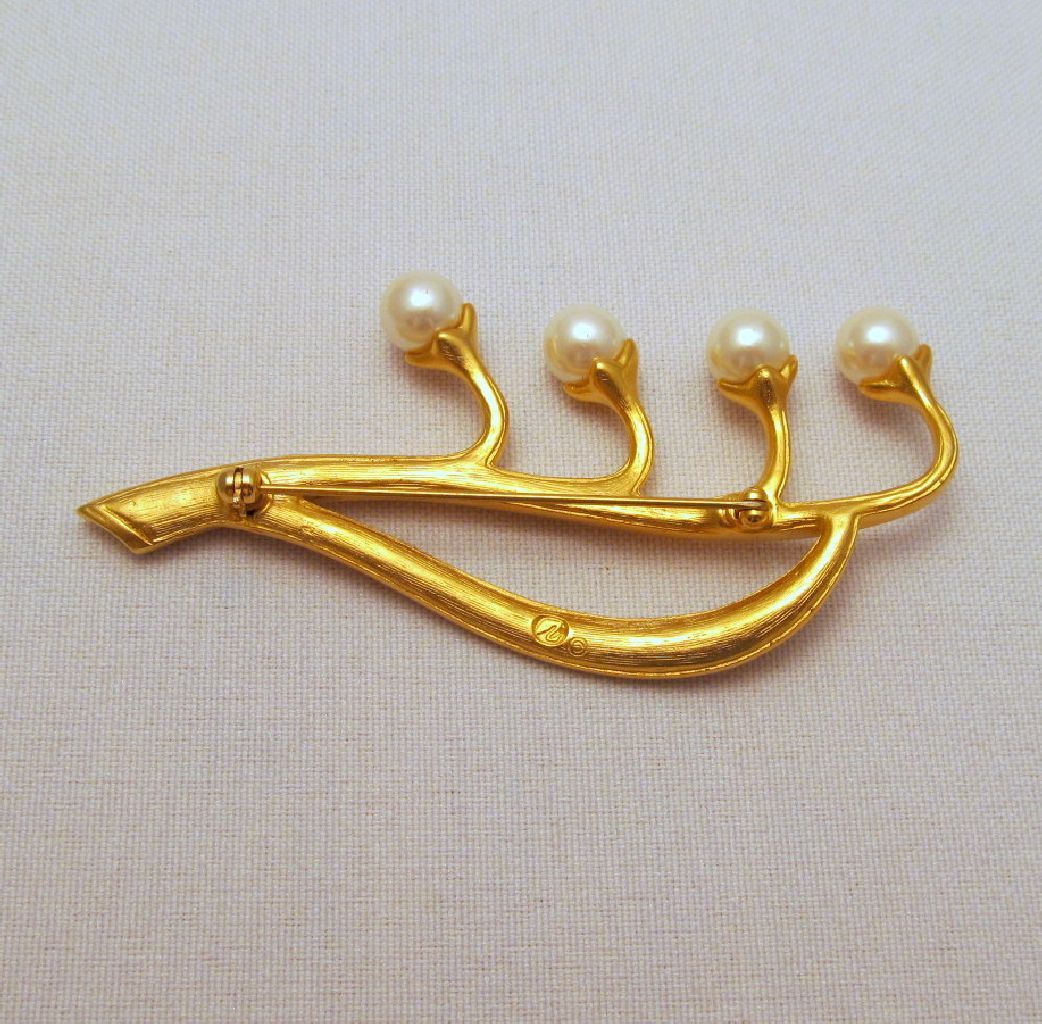 Signed Swarovski Lily of the Valley Faux Pearl Brooch Gold-tone Signed Swarovski Lily of the Valley Faux Pearl Brooch Gold-tone