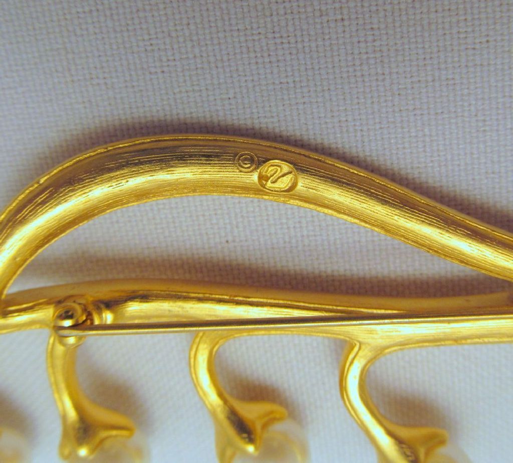 Signed Swarovski Lily of the Valley Faux Pearl Brooch Gold-tone Signed Swarovski Lily of the Valley Faux Pearl Brooch Gold-tone