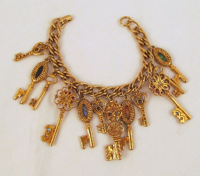 Skeleton Keys Victorian Revival Charm Bracelet Plastic Cabochons 12 Charms Skeleton Keys Victorian Revival Charm Bracelet Plastic Cabochons 12 Charms