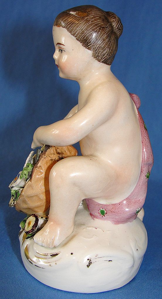 Antique Staffordshire Pottery Figurine - Boy with Flowers Looks like Meissen Antique Staffordshire Pottery Figurine - Boy with Flowers Looks like Meissen