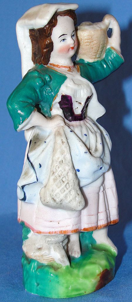 Antique Staffordshire Pottery figurine - Woman Carrying a Basket Antique Staffordshire Pottery figurine - Woman Carrying a Basket