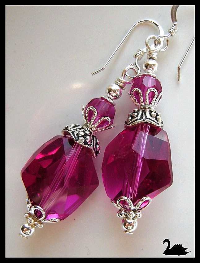 Swarovski Crystal Fuchsia Cosmic Cut Sterling Silver Earrings Swarovski Crystal Fuchsia Cosmic Cut Sterling Silver Earrings