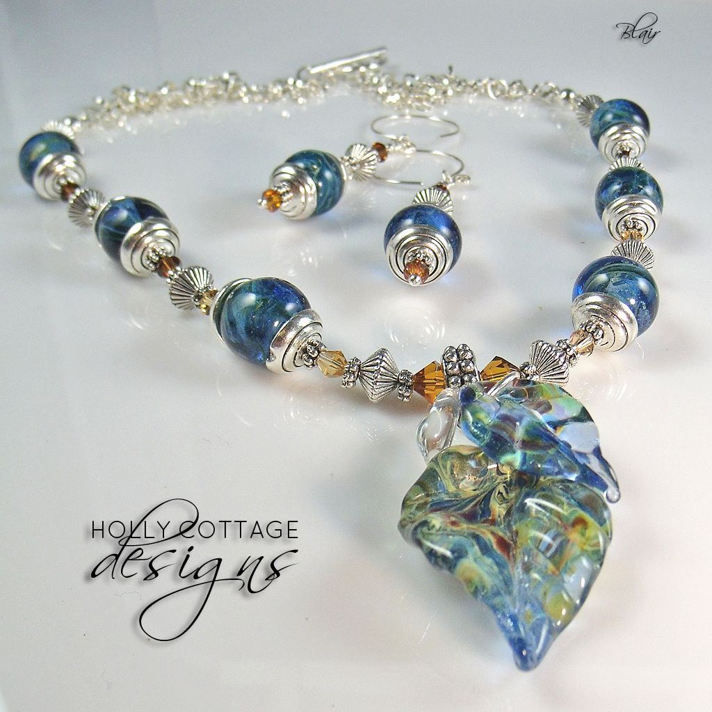 Artisan crafted necklace and earring set Artisan crafted necklace and earring set